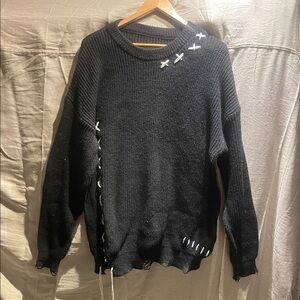 Stylish Black Sweater with Unique Stitching